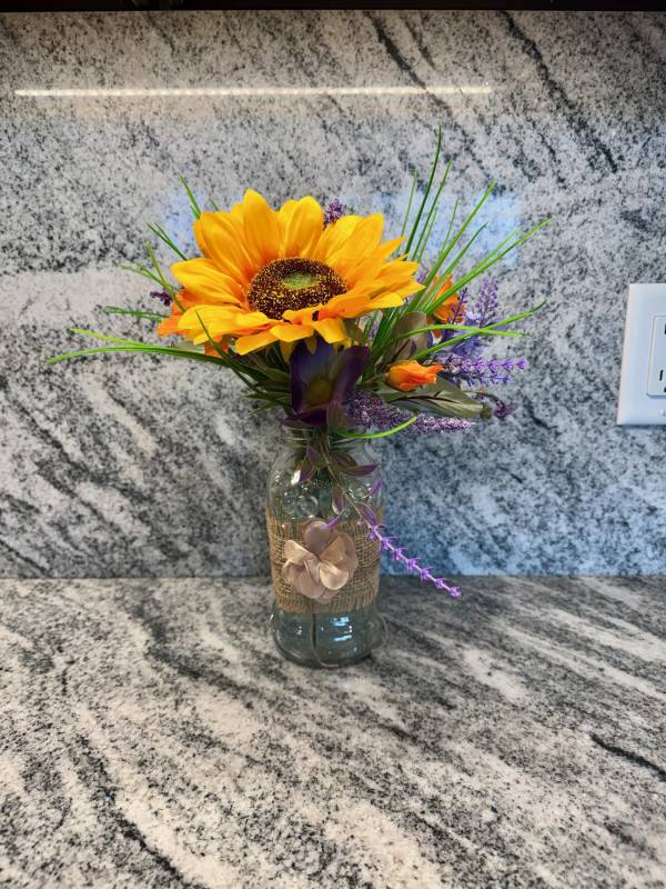 Lifestyle orange sunflower, lavender, poppy and grass